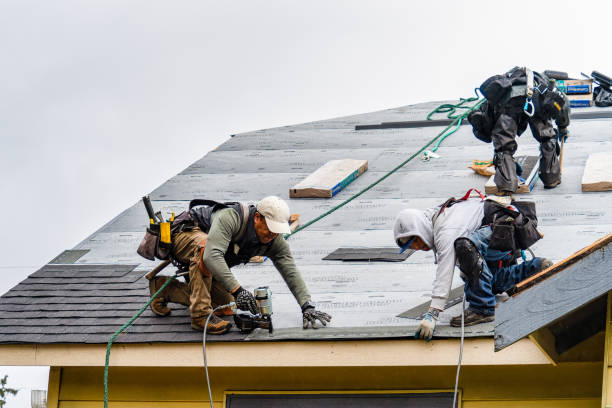 Professional Gutter Installation technician working in Pikesville, MD